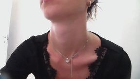 The thin neck of the black brunette,