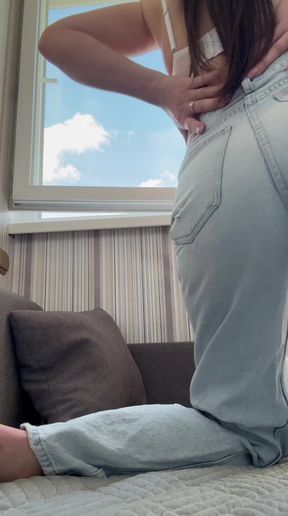 Tight jeans accentuate her curvy figure
