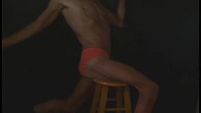 part 2 - down in the dark - groin stretching on the stool with dark background and bright briefs - with the light off