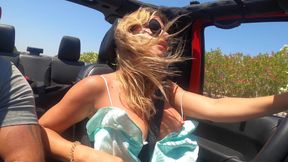 Busty Blonde MILF Gives Road Head While Driving