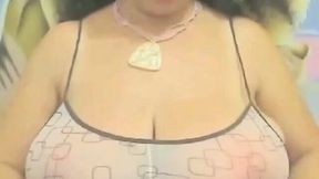 Busty webcam chick shows off her huge headlights