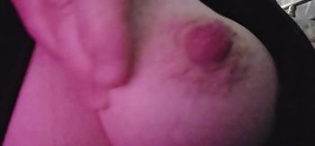 One tit and one hard nipple