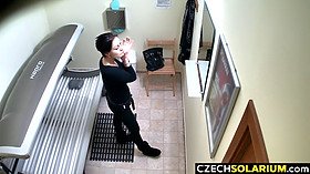 Luxury Busty brunette masturbates in solarium