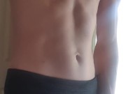 Twink teases his bulge revealing a thick dick