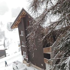 On the Balcony with Snow