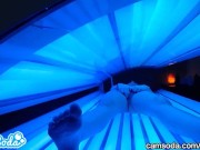 teen latina gets caught rubbing her clit while using a tanning bed