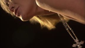 Blonde Milf sucks a cock near the pool at night