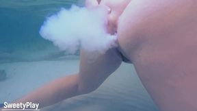 MILF's big ass takes ocean underwater enema punishment