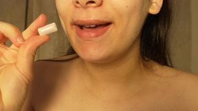 indian stepsister chews gum and blows bubble gum and shows her big tits while playing with her gum and big tits