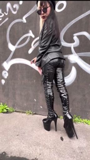Smoking fetish walk with pvc pleaser boots and leather Miss Sandra D