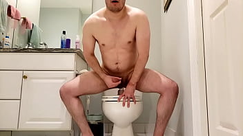 twink riding dildo on the toilet