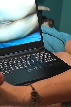 Watching Porn While Giving Handjob