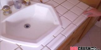 Daisy Stone plays with a guy's cock in the bathroom POV