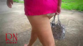 A lady masturbates in a car in a parking lot Teasing a clit with a dildo