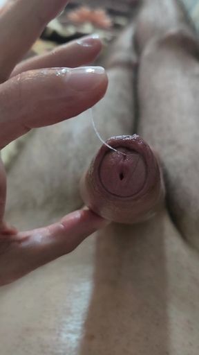 I play with my cock until I cum on a napkin