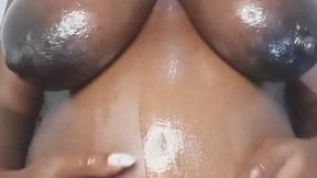Oiling big tits and pregnant belly