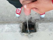 Uncut cock piss on a bridge through hole
