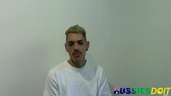 Blue eyed Aussie twink Beckett strokes his hard uncut cock