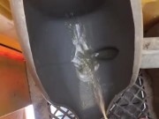 Taking a leak in the Port a Potty