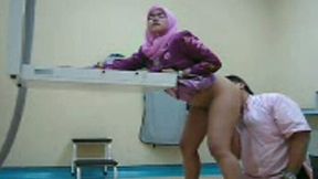 Happy office man rims his Malay wife and fucks her on the table