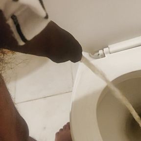 Indian black dick men peeing in the toilet