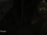 Girl Peeing in darkness into tropical river after sunset - Angel Fowler
