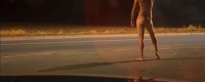 Totally naked barefoot in public road