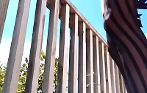 Slut in combined outfits outdoors