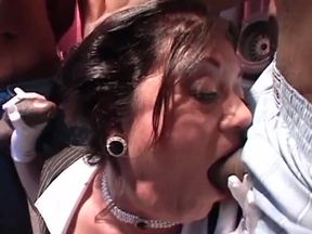 Nice tit MILF in stockings gets her cunt fucked by two black dicks in garage