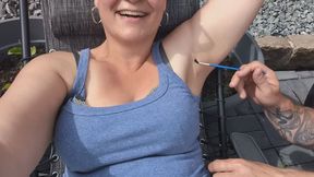 Tickling armpits in the garden