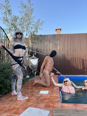 Cruel Tattooed MILF flogs and humiliates submissive prisoners