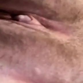 Close up black dildo in wet pussy