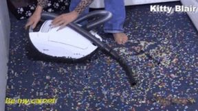 Kitty Blair vacuum confetti with brand new vacuum cleaner close cam