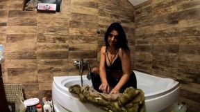 Playing in bathtub while wearing a fur coat and pantyhose 198