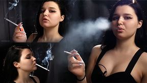 18 y-o Nastya is smoking two 120mm all white cigarettes