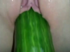 Pleasing my petite white girlfriend with a cucumber