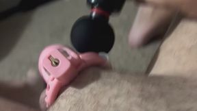 Sissy in chastity cage uses electronic massager for on cage