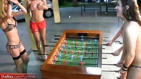 T-girls strip down lingerie and stockings playing foosball