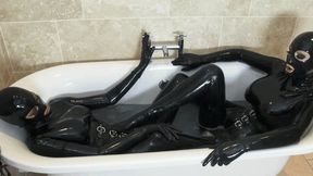 Two Hot Babes Full Encased In Black Latex Catsuit In Rubber Bathing - Part 1 of 3 - The Pussy Meeting