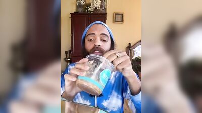 Handsome guy with a sexy beard does a smoothie bowl review