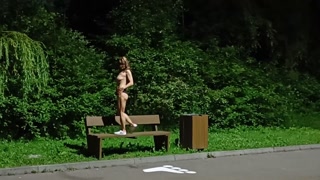 Horny milf walking naked on the bike path