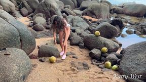 Naked Girl Found a Coconut on a Beach and Poured the Juice Over Her Body