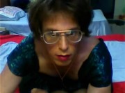 Shemale Lydia in green dress brown pantyhose and red heals with long dildo