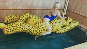 Alla gets fucked hard by a big glossy squeaky inflatable cheetah in the pool