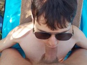 Sporty twink boy gives a public blowjob to mature gigantic dick on the wild beach, til cum overflows