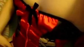 Super naughty chick in red corset just loves to have sex on camera