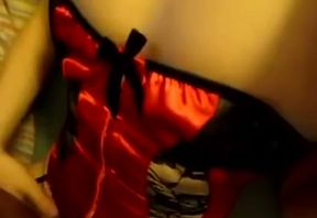 Super naughty chick in red corset just loves to have sex on camera
