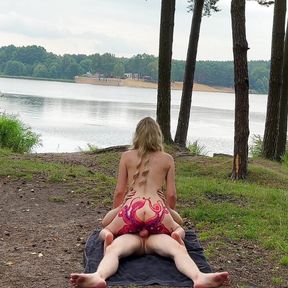 Naked blonde roughly rides big cock outdoors in forest until gets huge cumshot load on boobs