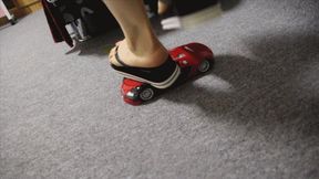 Asian model smashing toy car