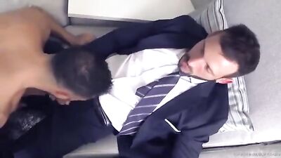 Masculine gay sex in a suit with a tie